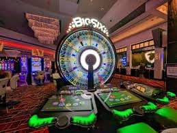Tampilan studio live dealer abadislot dengan dealer profesional dan multiple camera angles
